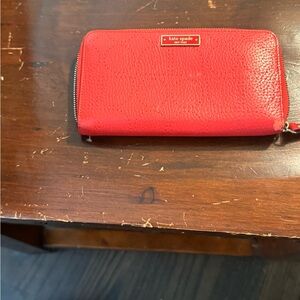 Kate Spade Vibrant Red Zip Wallet
Minor scuffs on exterior